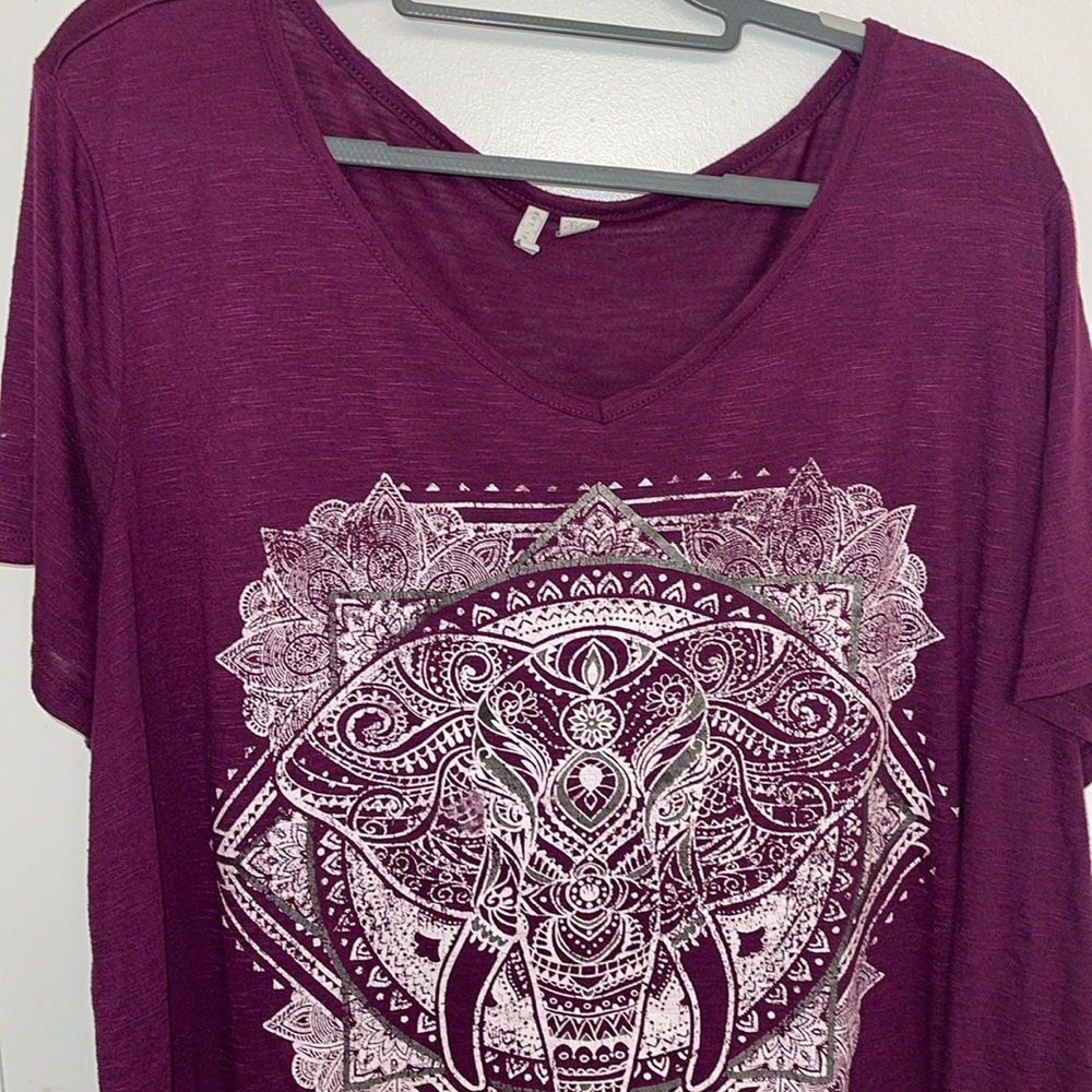 Burgundy shirt with design on the front